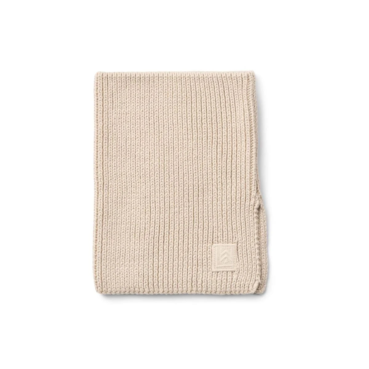 Der beige Halswärmer "Mathias" von Liewood ist eine gute Alternative zum Schal. Einfach unter der Jacke anziehen und keine nervigen Enden.