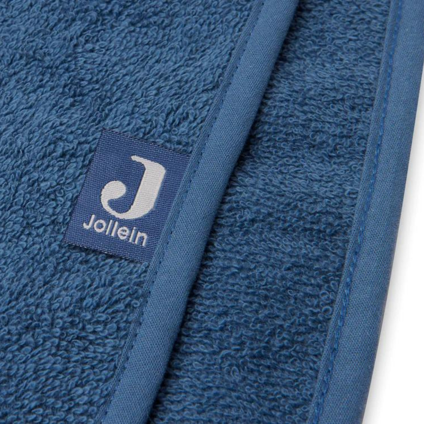 Jollein Markenlabel am blauen Frottee-Badeponcho – hochwertige Qualität als Geschenk zur Geburt