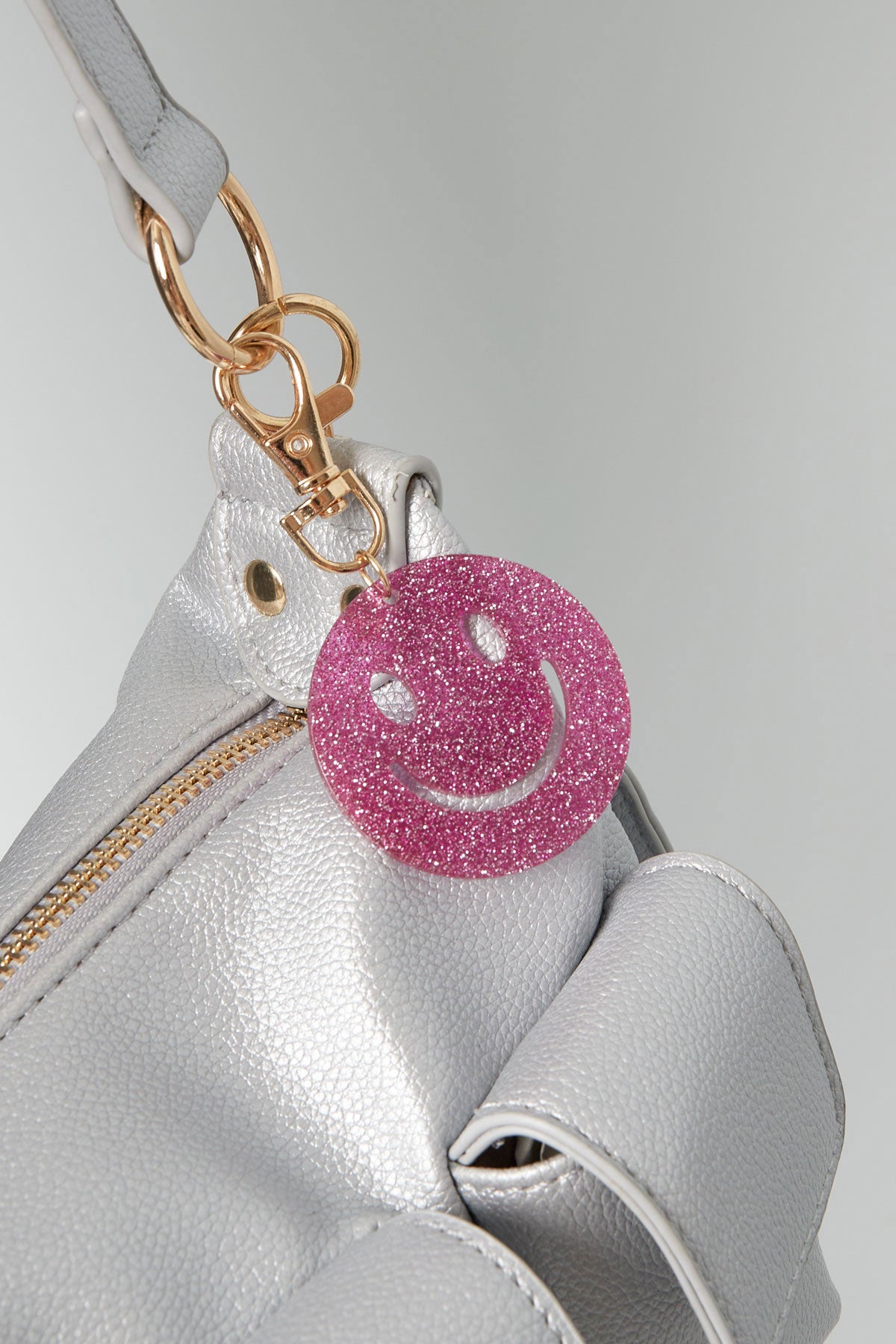 "Keep Smiling" Glitzer-Schlüsselanhänger mit Smiley, verschiedene Farben