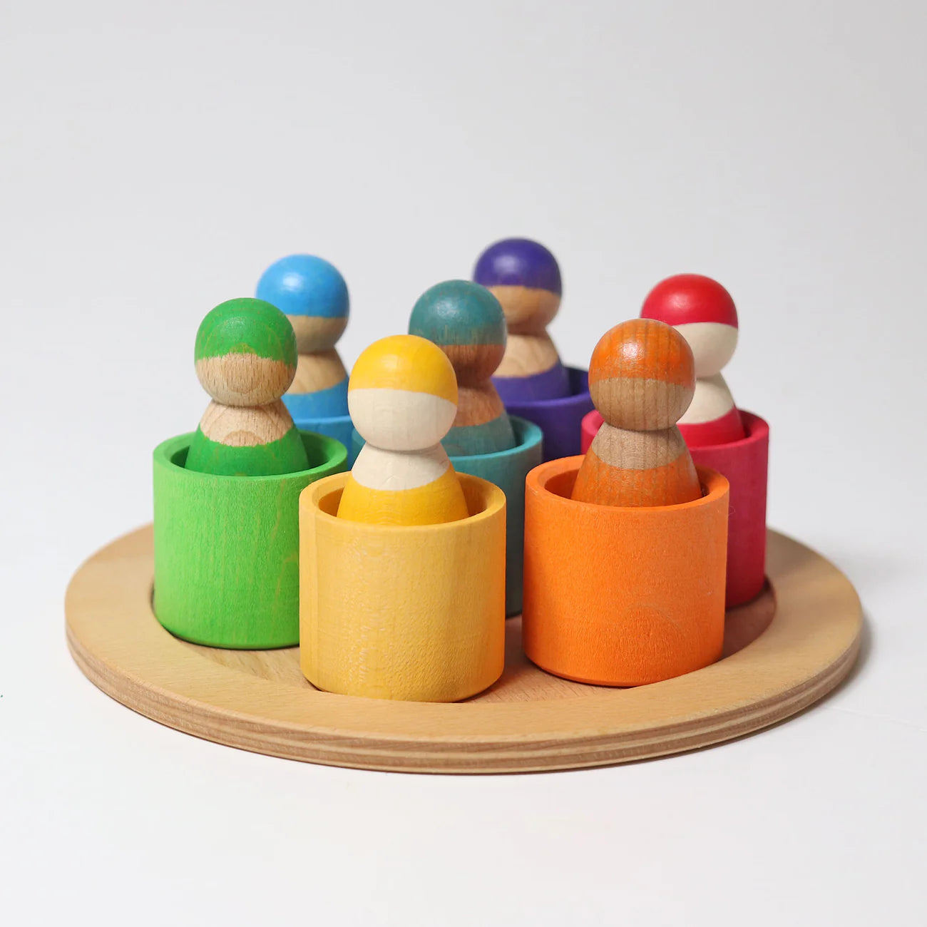 Zeven vriendjes in houten bakjes van Grimms