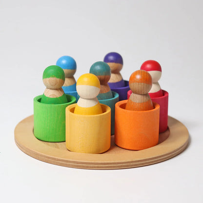 Zeven vriendjes in houten bakjes van Grimms