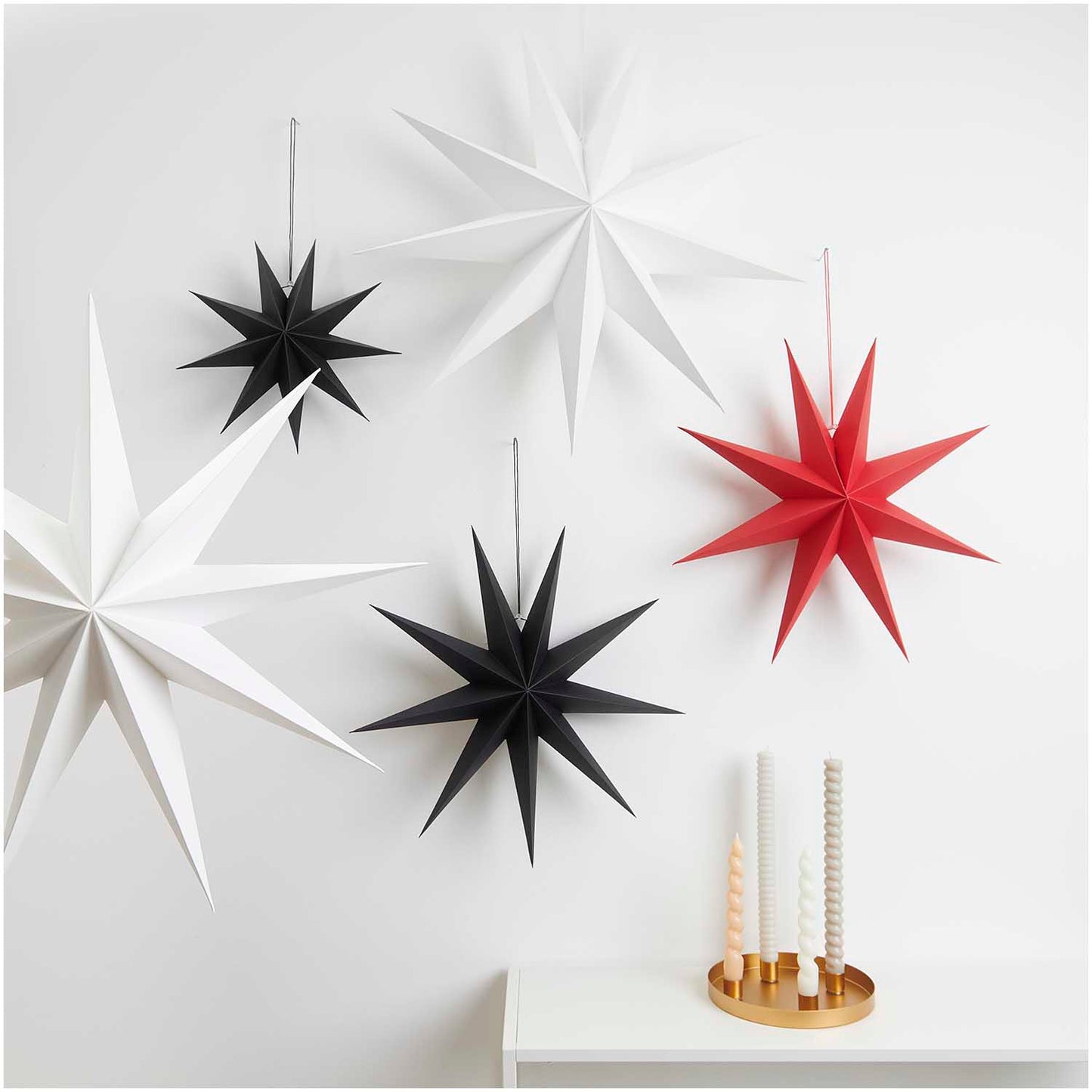 Opvouwbare papieren ster (45 cm) als decoratie om op te hangen, wit of zwart