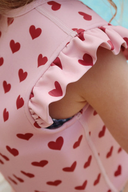 Rosa Schwimmweste "Amour Pink" mit Herz-Motiv von Konges Slojd
