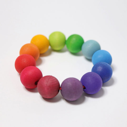 Bunter Regenbogen-Perlenring von Grimms