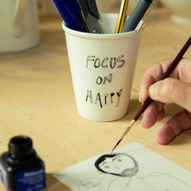Tasse "Focus on Happy" aus Porzellan von helen b.