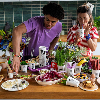 Tasse "Do more of what makes you happy!" aus Porzellan von helen b.