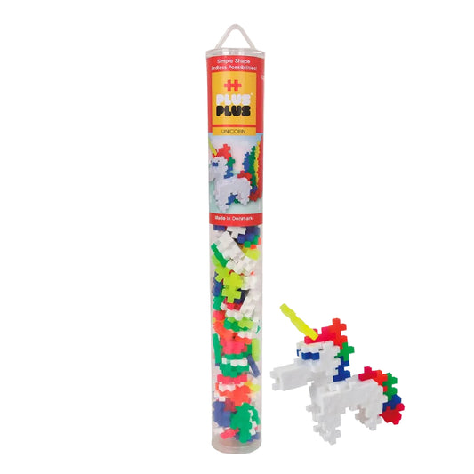 Plus-Plus Unicorn Tube mit allen Bausteinen und Anleitung zum Bauen eines Einhorns, daneben das fertig zusammengebaute Einhorn