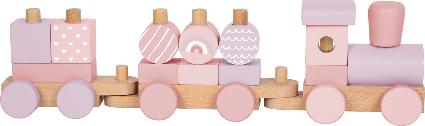 Rosa Holzzug von Small Foot in der Seitenansicht mit allen Stapelelementen und Lokomotive in Fahrtrichtung rechts – mit Herzchen-, Streifen-, Regenbogen- und Wellenmotiven in Rosa, Flieder und Naturholz – nachhaltiges Holzspielzeug zur Förderung der Feinmotorik