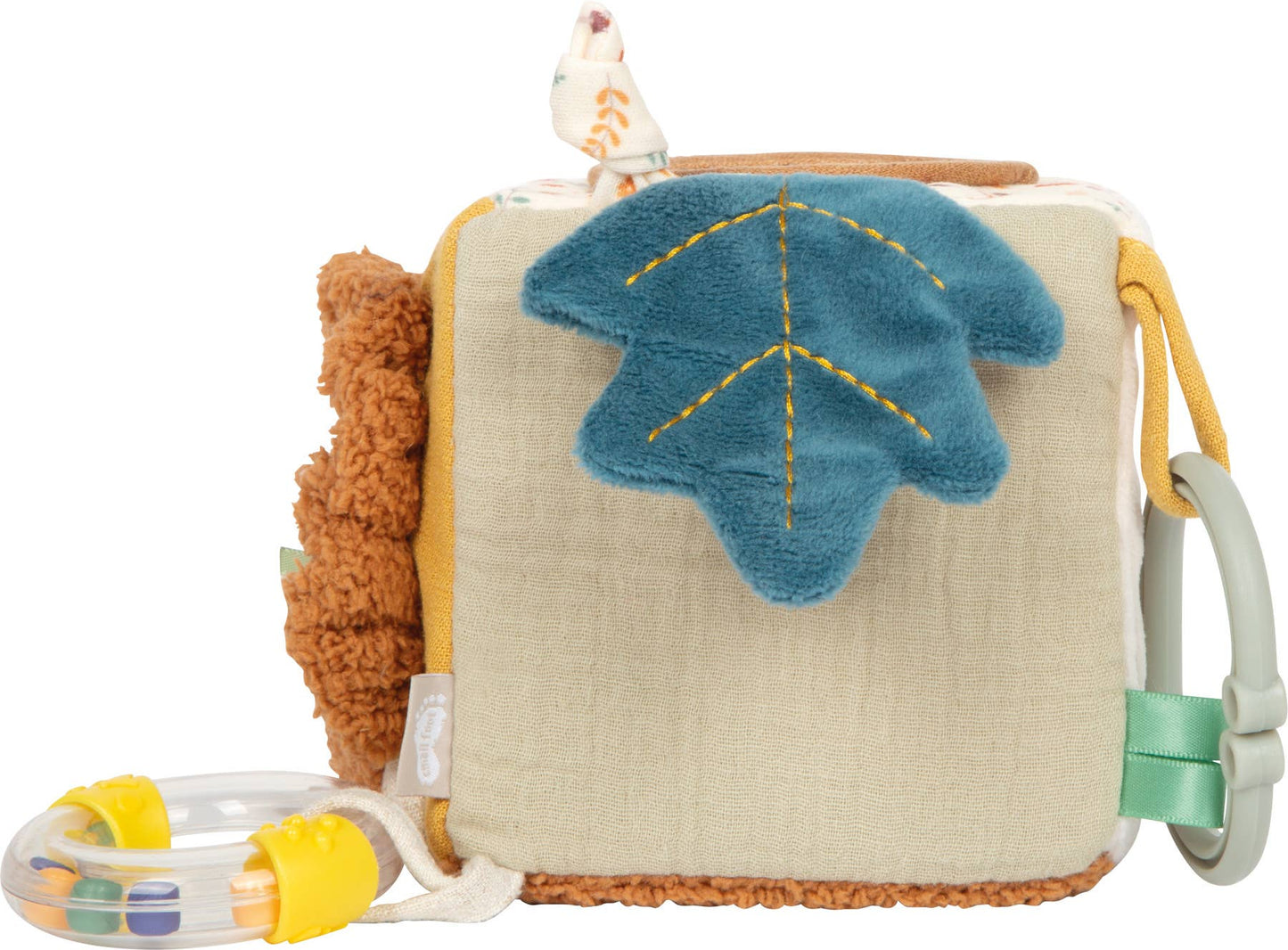 Spielwürfel „Little Lion" von Small Foot mit blauem Plüsch-Blattmotiv und gelber Stickerei auf beigem Stoff, seitlichem Greifring und transparenter Rassel mit bunten Kugeln – Babyspielzeug zur Förderung der Sinne ab 0 Monaten