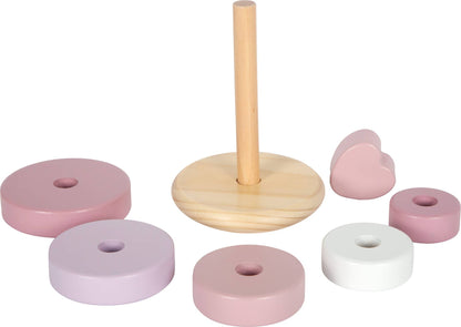 Einzelteile des rosa Stapelturms aus Holz von Small Foot mit Naturholz-Sockel, fünf Ringen in Rosa-, Lila- und Weißtönen sowie rosa Herz-Topper – nachhaltiges Holzspielzeug zur Förderung der Feinmotorik und Farberkennung