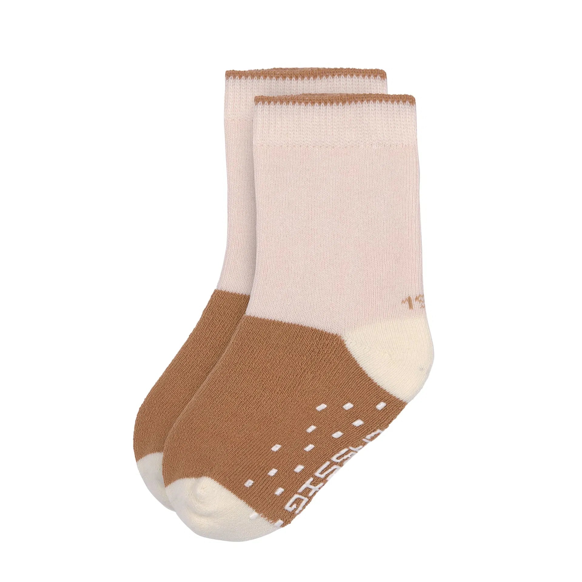 Rosa Anti-Rutsch-Socken von Lässig mit karamellfarbener Sohle und Noppen für sicheren Halt