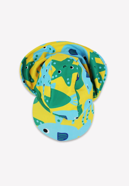 Toby Tiger Baby Sonnenhut mit Fisch-Druck Draufsicht gelb grün blau – Sonnenschutzmütze von oben mit Meerestier-Motiv, UV-Schutz UPF 50 für Strand und Schwimmbad