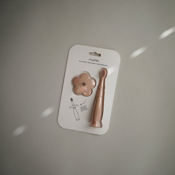 Silikonzahnbürste für Babys und Kleinkinder von Mushie, Blush